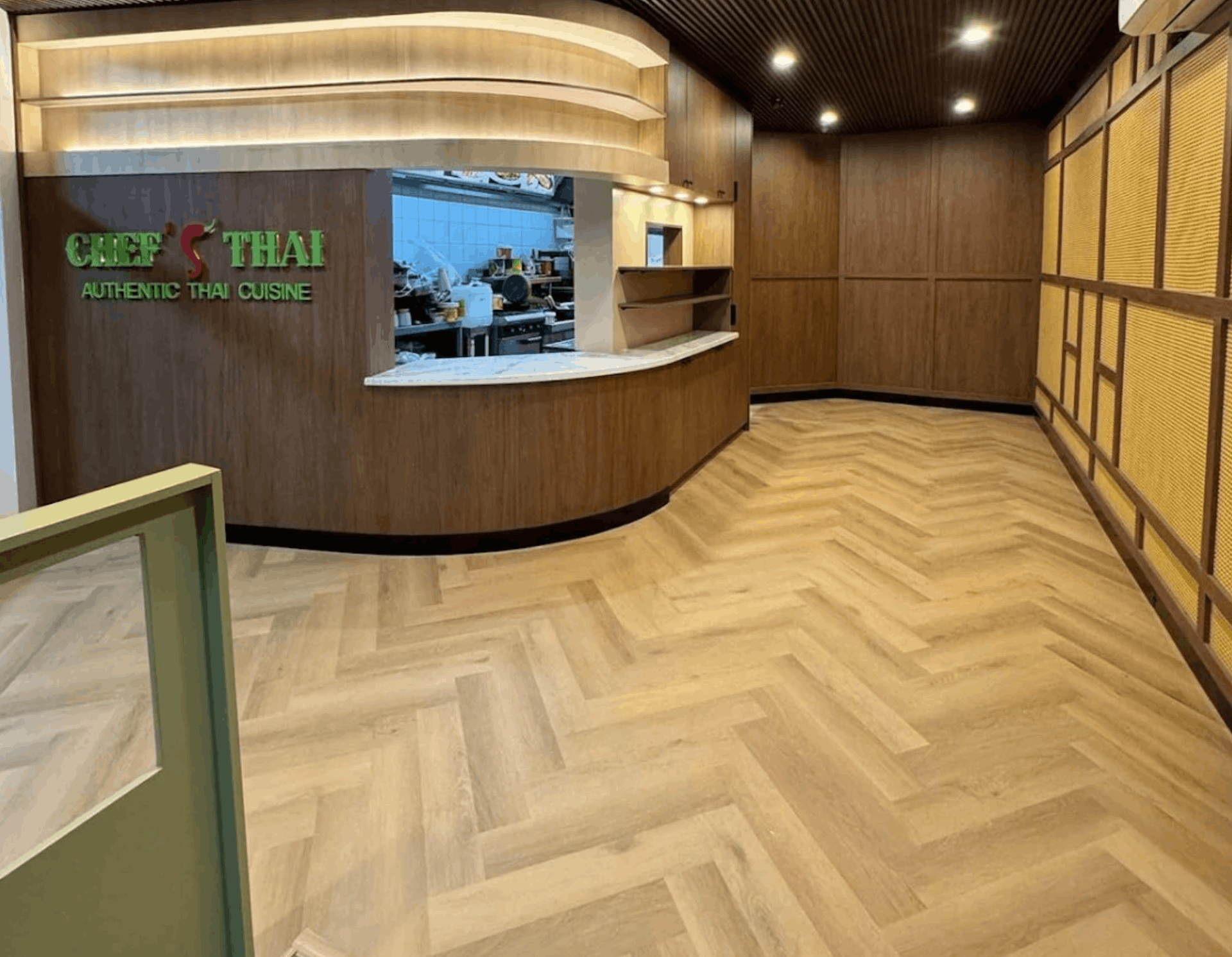 Herringbone hybrid flooring installed in Chef Thai hospitality fitout Melbourne